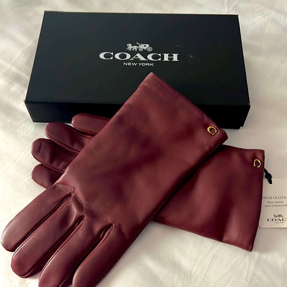 Coach  Burgundy gloves new with tags and box. Never worn
